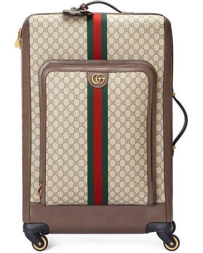 brown gucci suitcase|Gucci large suitcase.